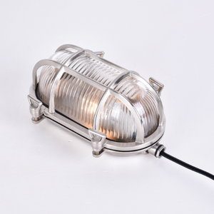 Barge wall light, cage light, glass and metal light, outside light. vintage wall light, industrial light, wholesale lighting nz, wholesale lights new zealand, bathroom lights, bathroom wall lights, outdoor lighting, industrial wall lights, nordux helford
