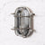Barge wall light, cage light, glass and metal light, outside light. vintage wall light, industrial light, wholesale lighting nz, wholesale lights new zealand, bathroom lights, bathroom wall lights, outdoor lighting, industrial wall lights, nordux helford